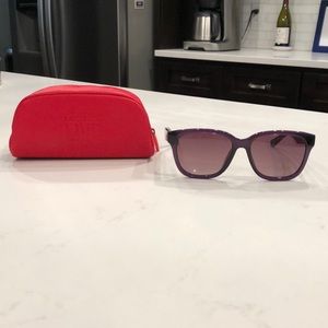 Purple Lacoste Live Sunglasses with red case